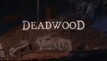 Title image for the HBO series Deadwood, showing the show's name in worn lettering over a frontier street.