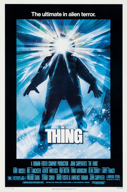 Theatrical poster for John Carpenter's The Thing (1982), showing a figure with a glowing face.